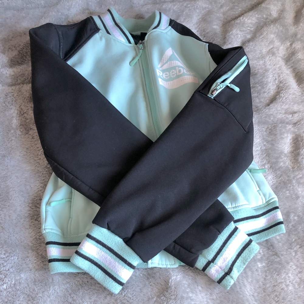 Blue,Black,White Reebok sweater.